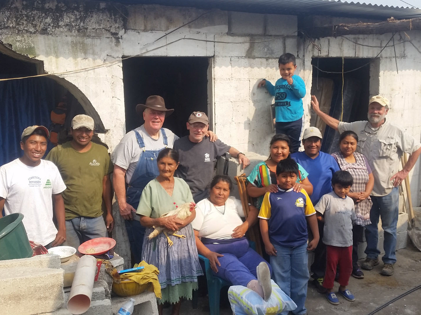 Making an Impact: Brush Arbor's Initiative and the Power of Giving Back 1 BuyOne BuildOne, Family in front of home
